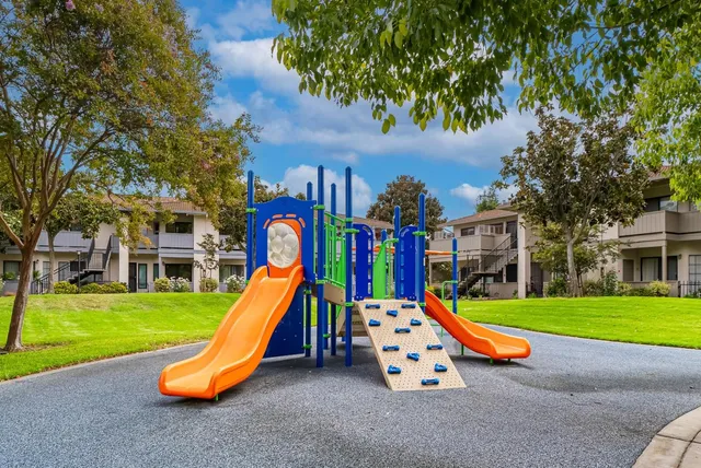 a view of a park with slide
