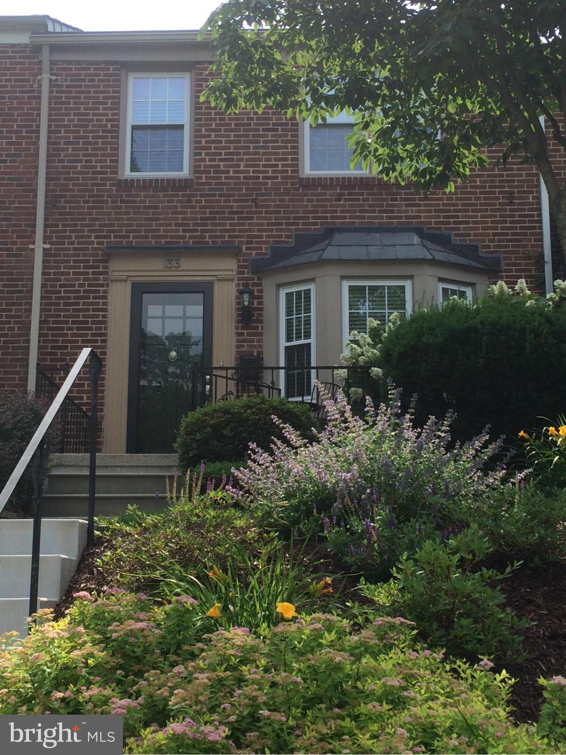 133 Stanmore Road Baltimore, MD 21212 - Photo 1 of 21 a front view of house with yard and green space