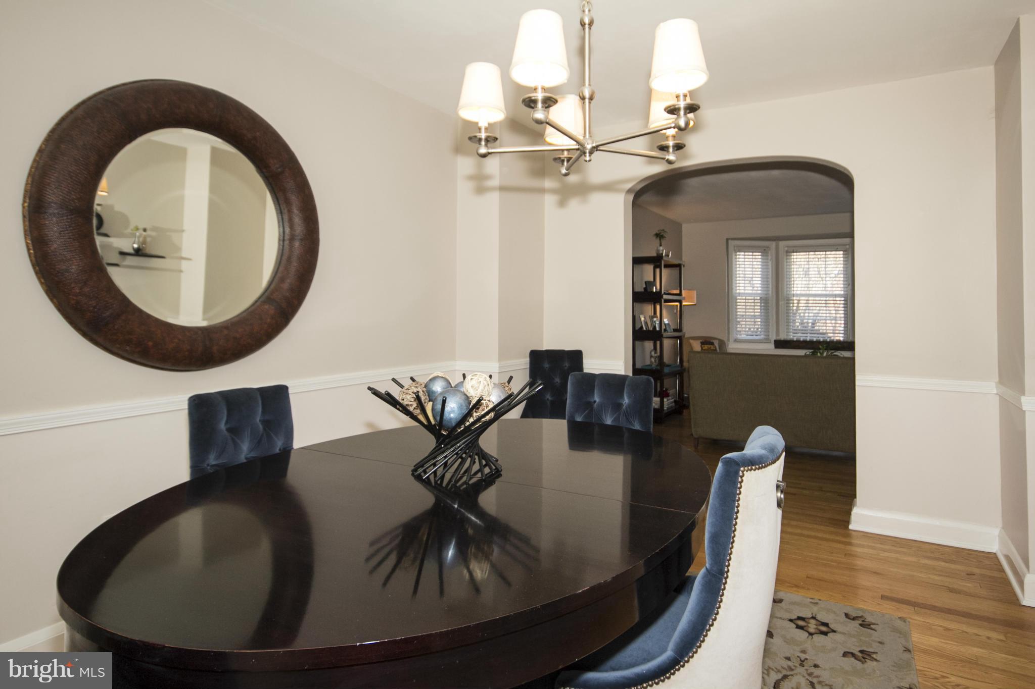 133 Stanmore Road Baltimore, MD 21212 - Photo 7 of 21 a view of a dining room with furniture and wooden floor