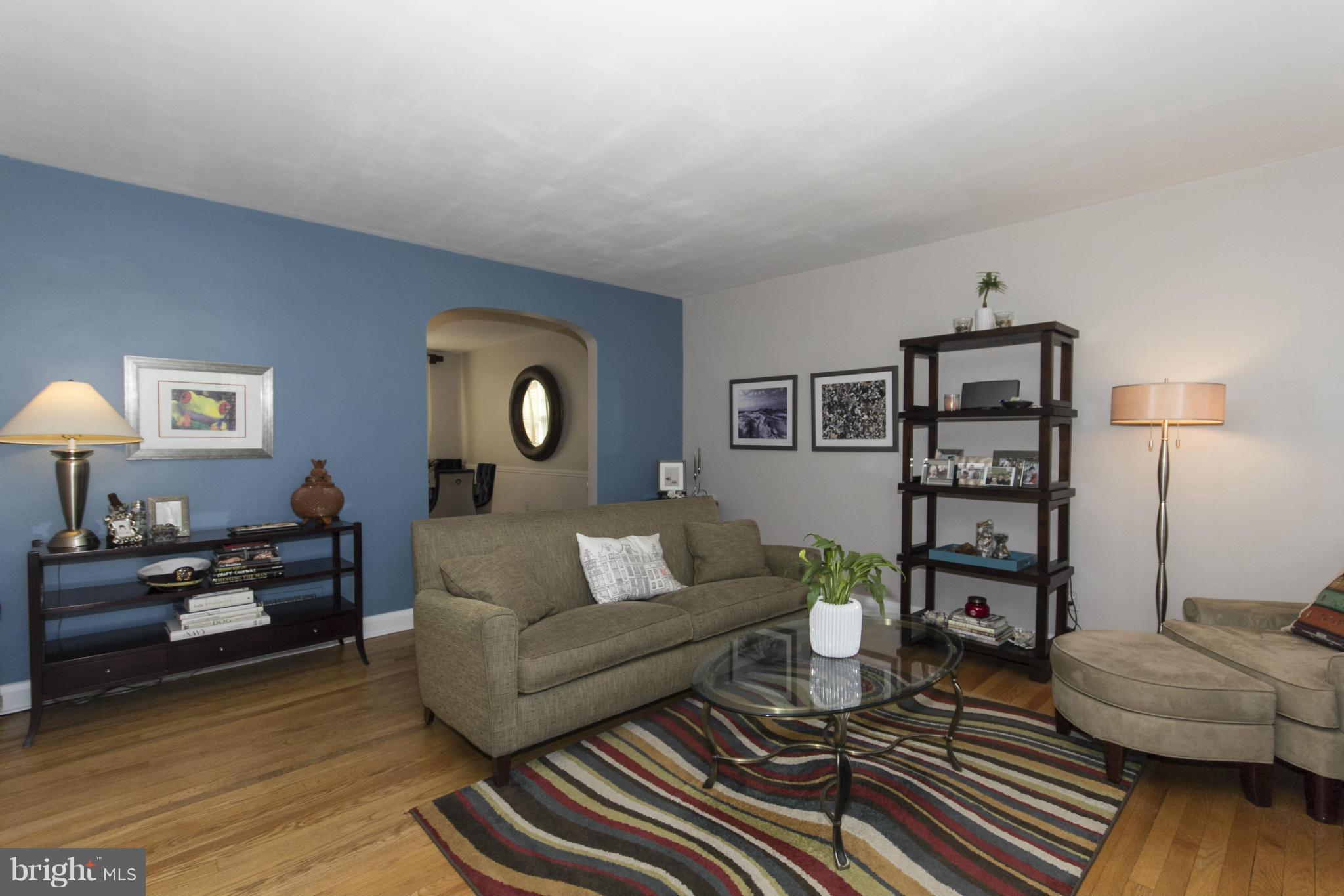 133 Stanmore Road Baltimore, MD 21212 - Photo 9 of 21 a living room with furniture and wooden floor