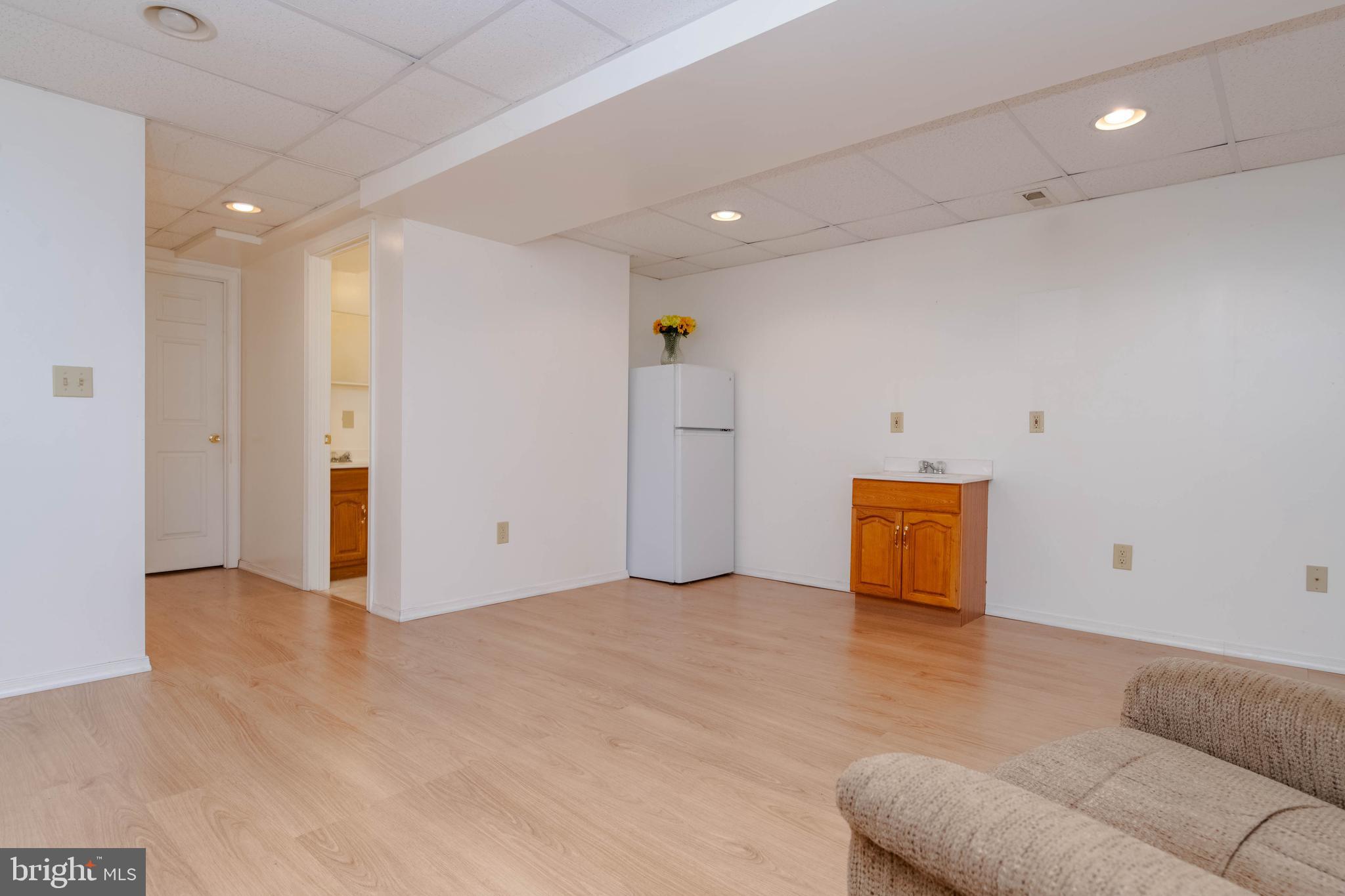 7707 Norfolk Road Glen Burnie, MD 21060 - Photo 28 of 49 Lower Level Recreation Room