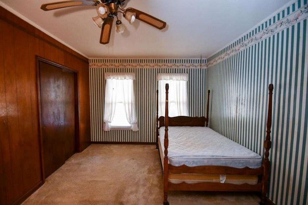 18 Corinth Church Road Cleveland, GA 30528 - Photo 12 of 37 a bedroom with a bed and window