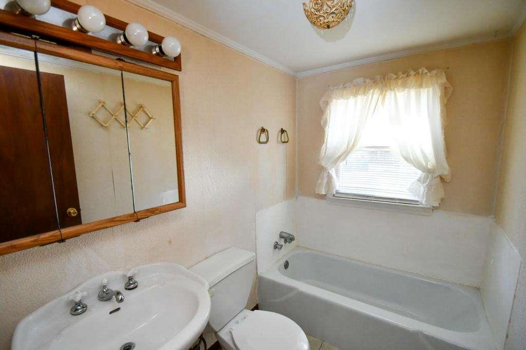 18 Corinth Church Road Cleveland, GA 30528 - Photo 15 of 37 a bathroom with a sink toilet and shower