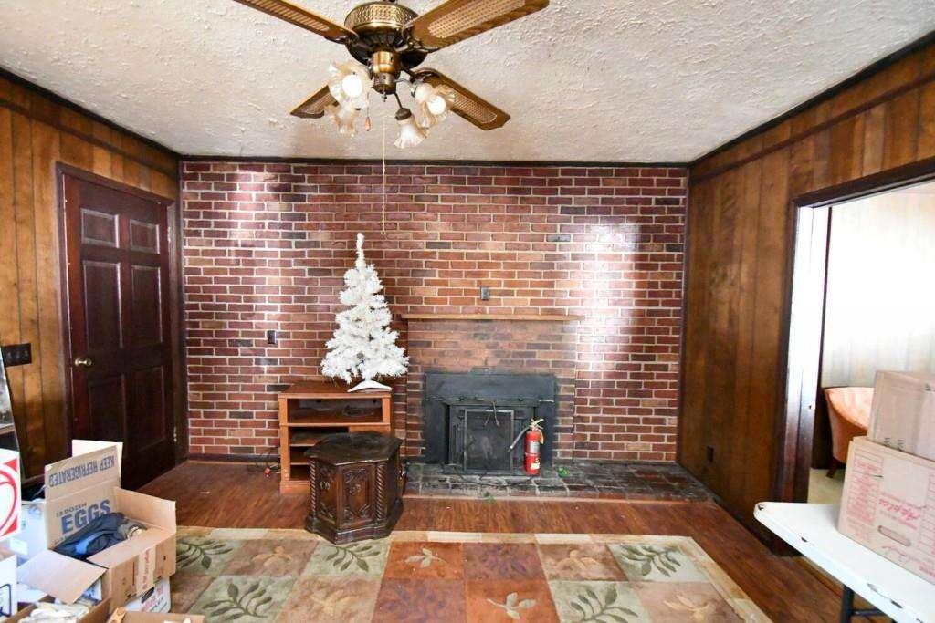 18 Corinth Church Road Cleveland, GA 30528 - Photo 17 of 37 a living room with fireplace furniture and a window