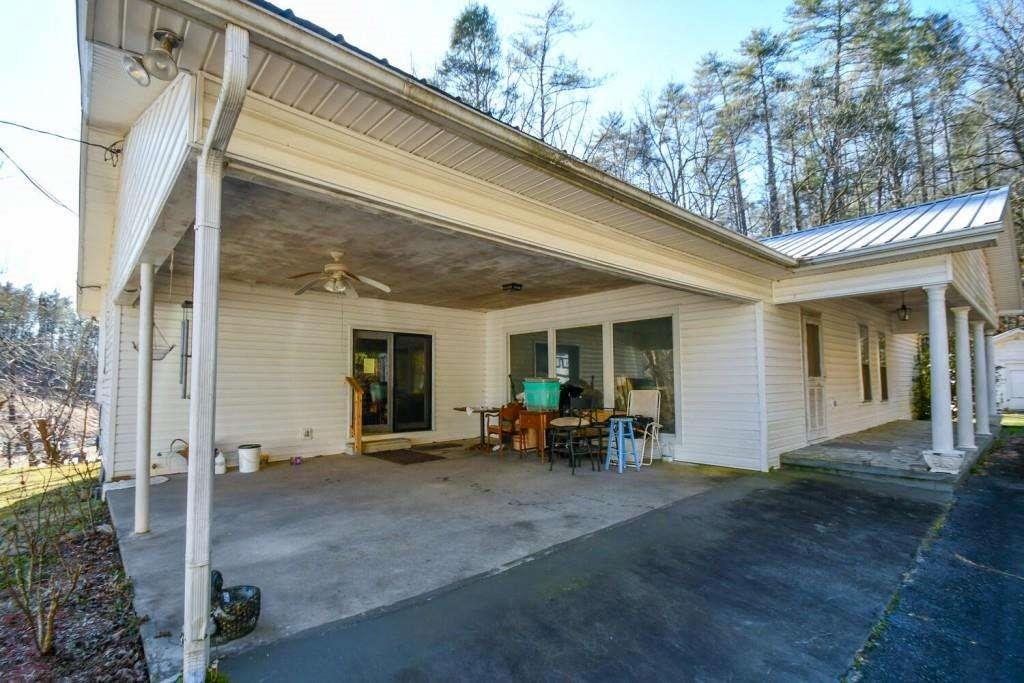 18 Corinth Church Road Cleveland, GA 30528 - Photo 28 of 37 a view of a house with outdoor seating