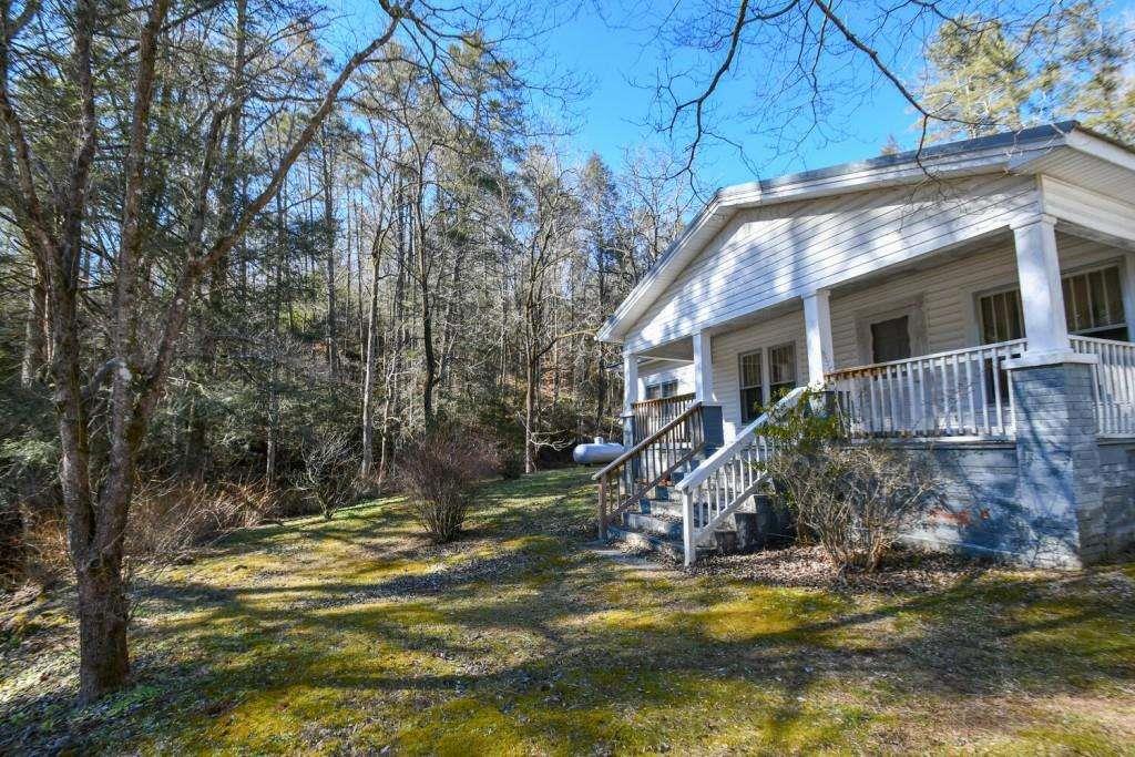 18 Corinth Church Road Cleveland, GA 30528 - Photo 9 of 37 a view of a house with backyard and sitting area