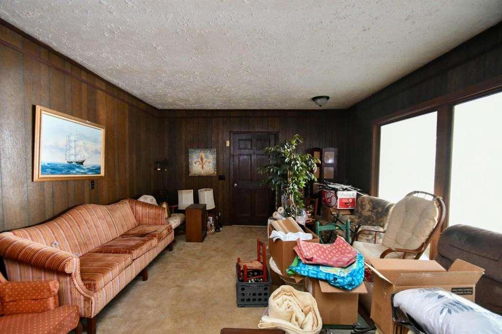 18 Corinth Church Road Cleveland, GA 30528 - Photo 10 of 37 a living room with furniture and a potted plant