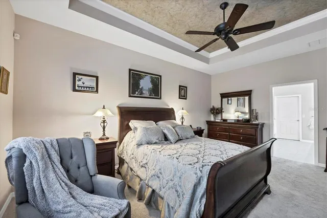 a bed room with a bed and a couch