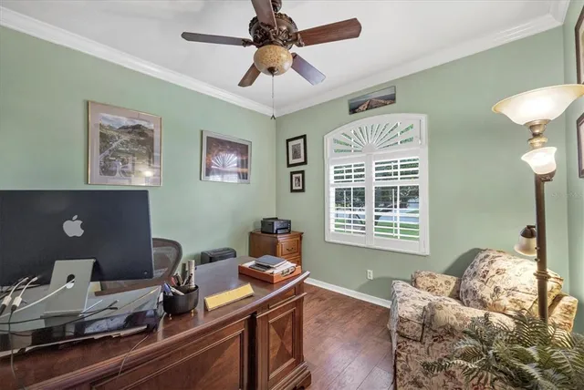 a workspace with furniture and a window