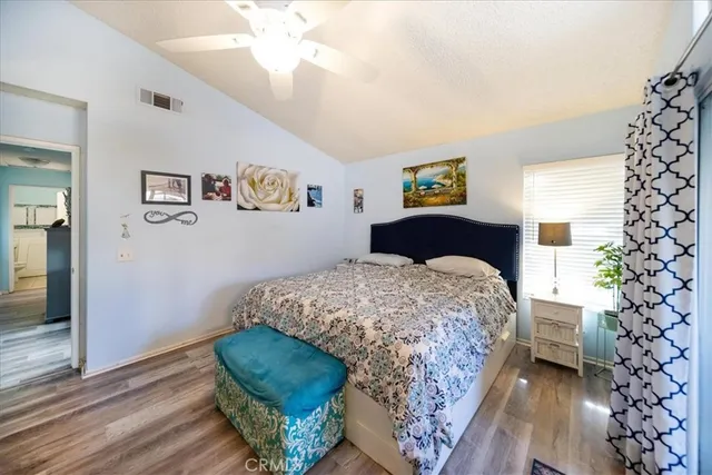 a bathroom with a sink a toilet and shower curtain