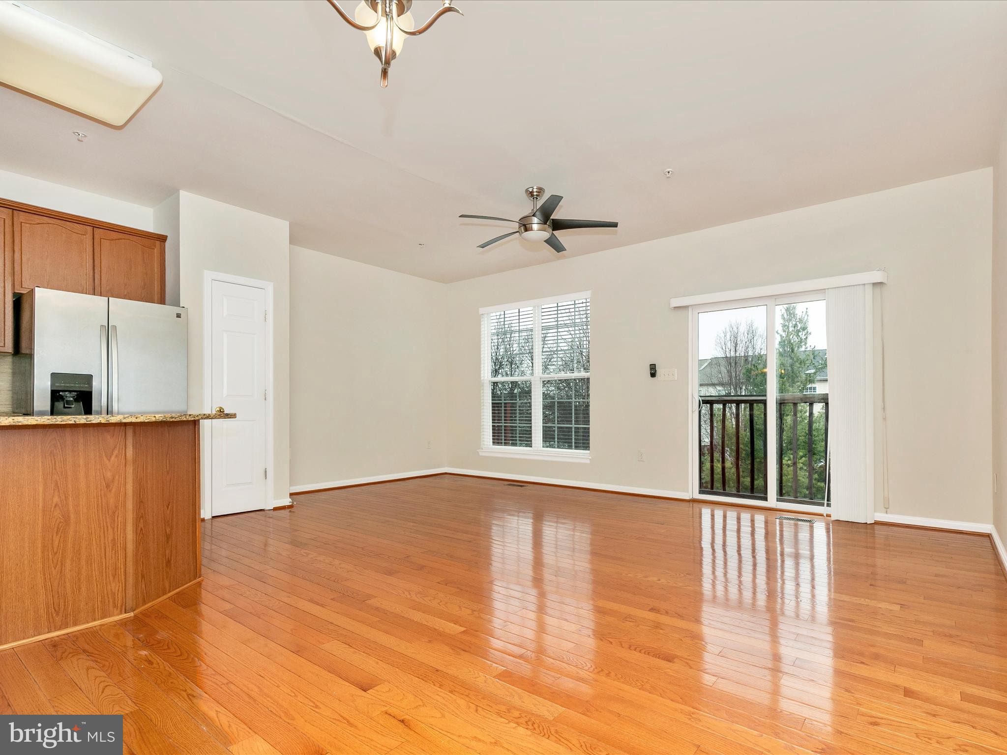 2534 Emerson Drive Frederick, MD 21702 - Photo 20 of 55 a view of an empty room with a window and wooden floor