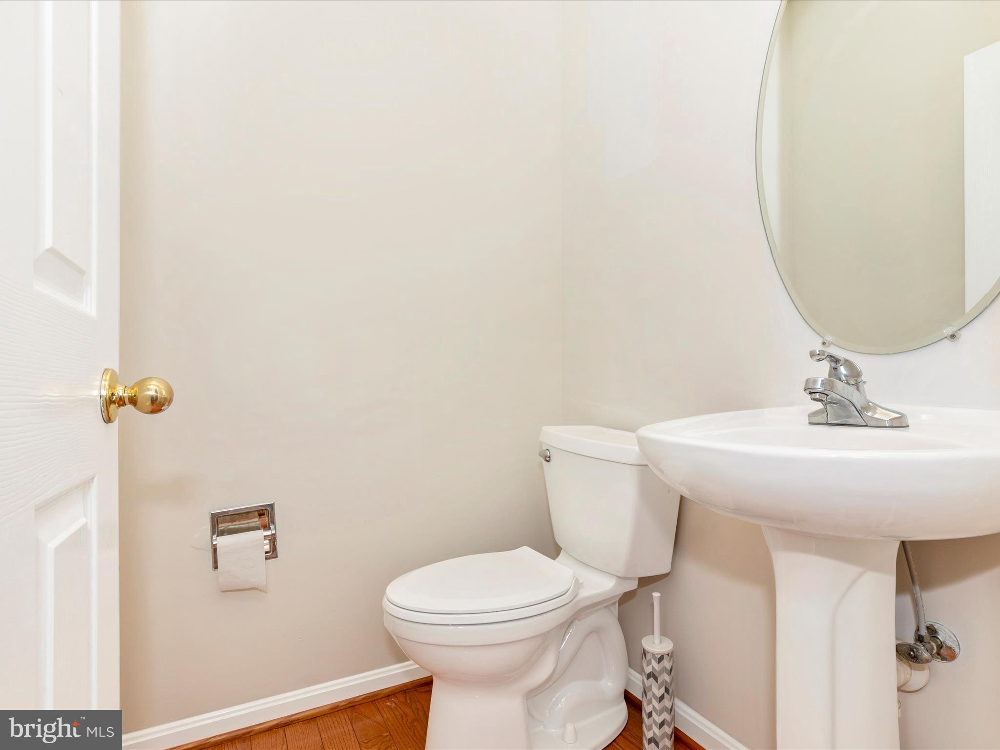 2534 Emerson Drive Frederick, MD 21702 - Photo 26 of 55 a bathroom with a toilet a sink and mirror