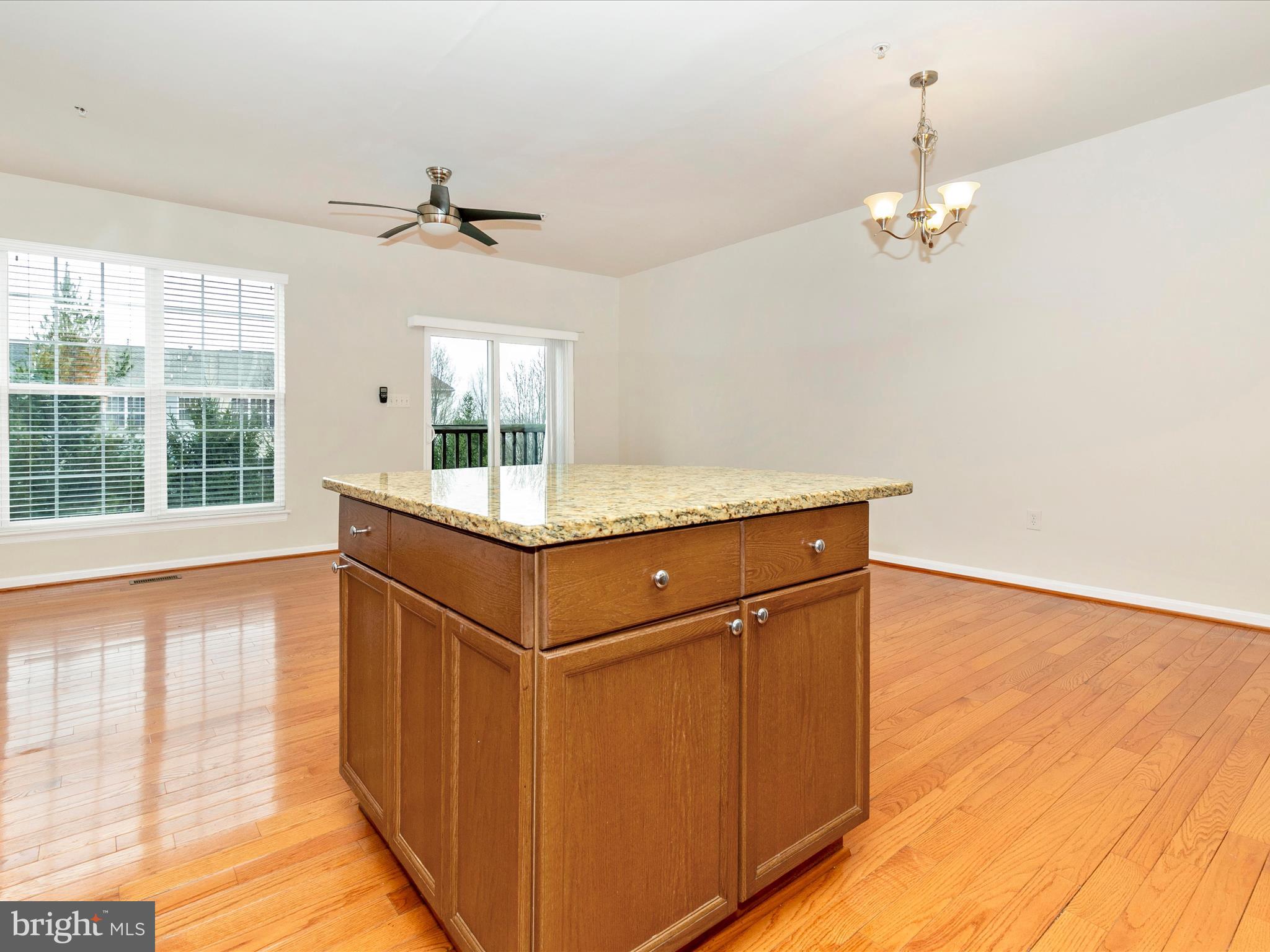 2534 Emerson Drive Frederick, MD 21702 - Photo 27 of 55 a kitchen with a stove and a chandelier