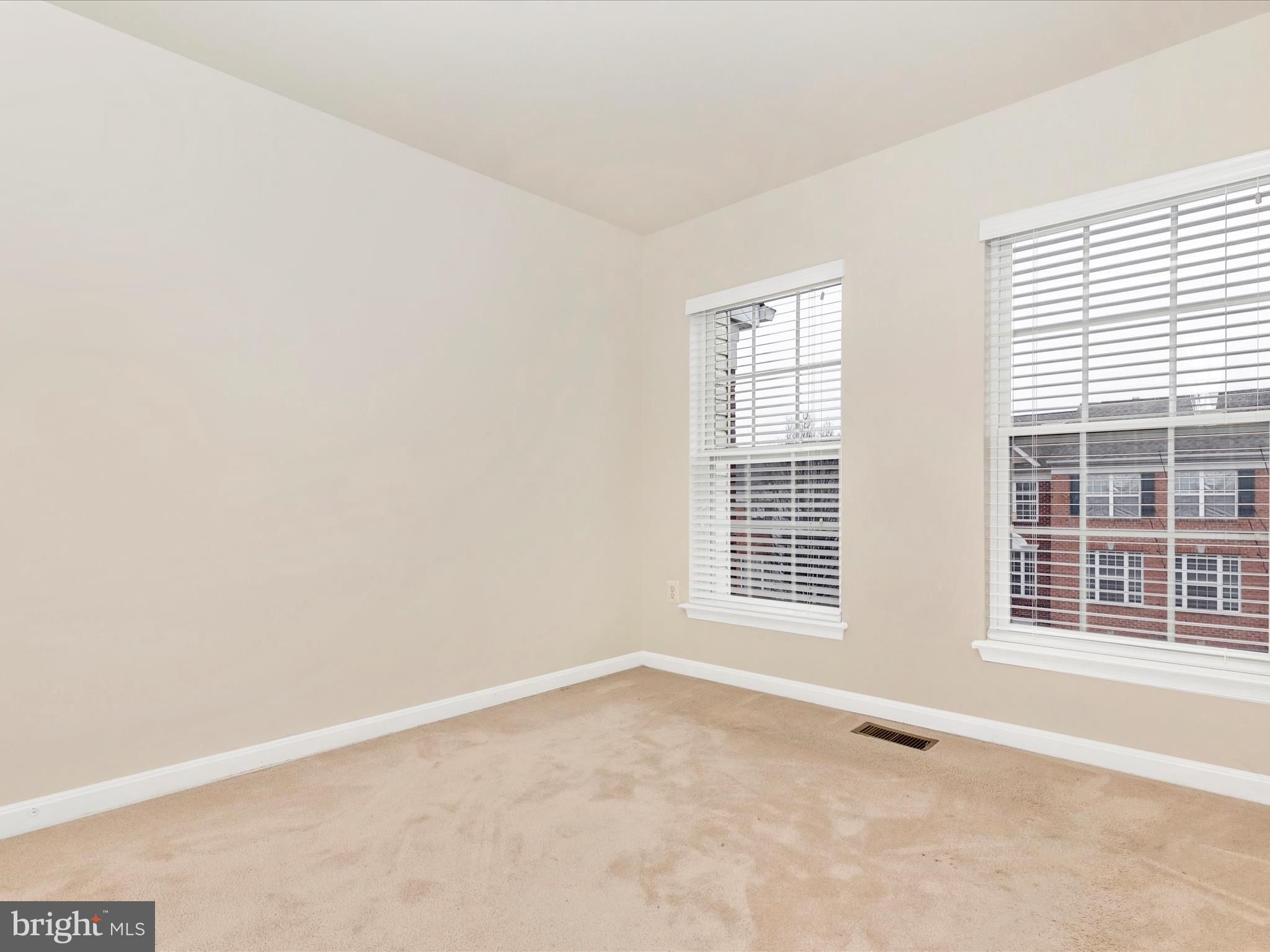 2534 Emerson Drive Frederick, MD 21702 - Photo 38 of 55 a view of an empty room with a window