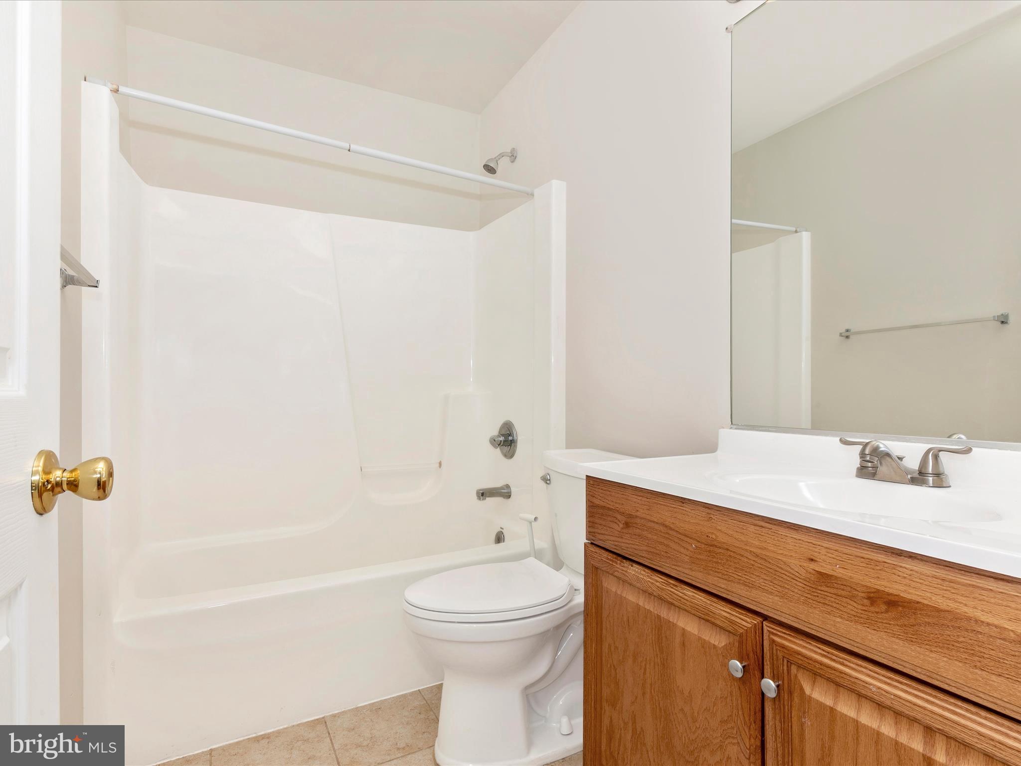 2534 Emerson Drive Frederick, MD 21702 - Photo 41 of 55 a bathroom with a sink a toilet and shower