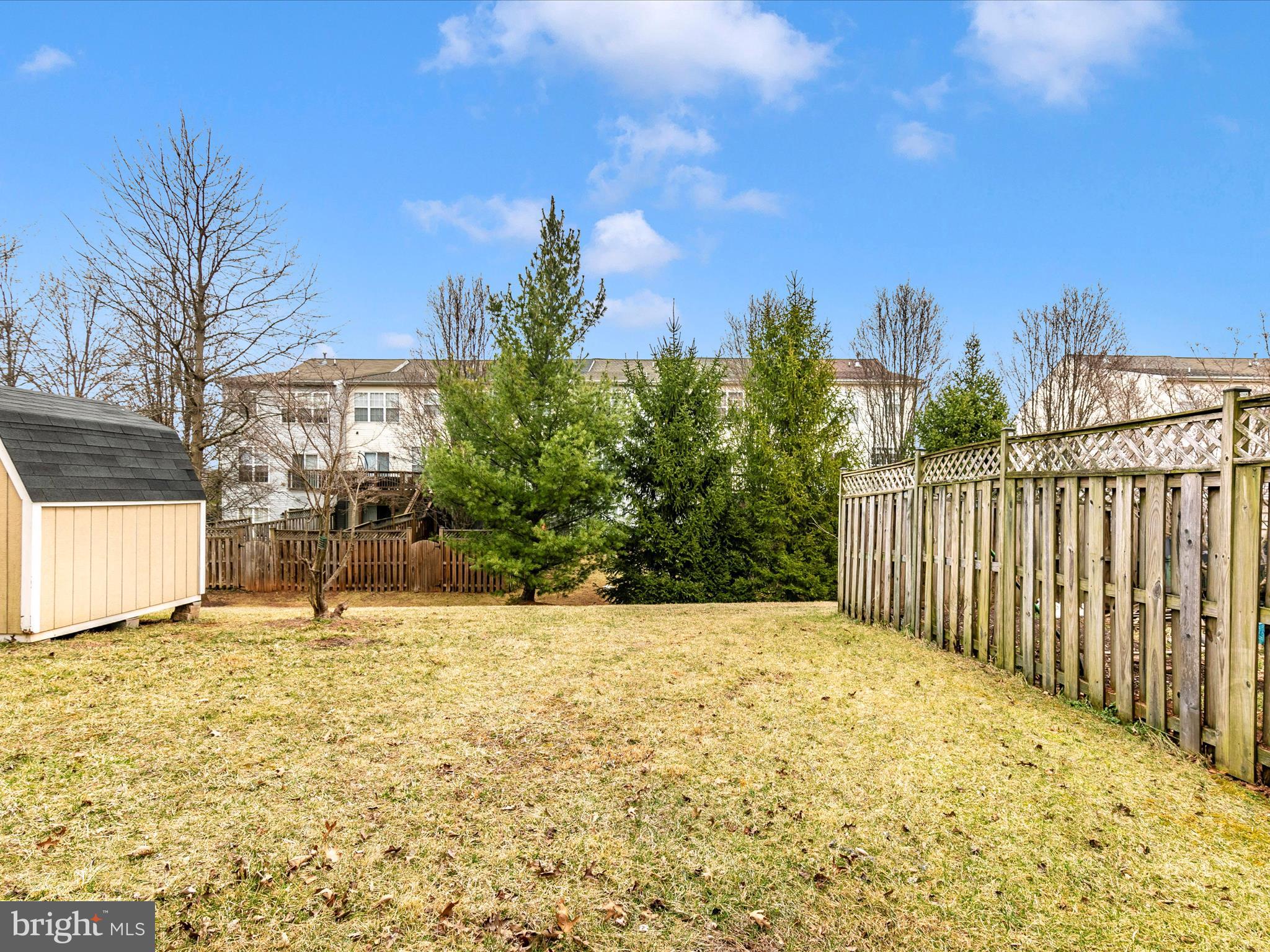 2534 Emerson Drive Frederick, MD 21702 - Photo 7 of 55 a view of backyard with wooden fence