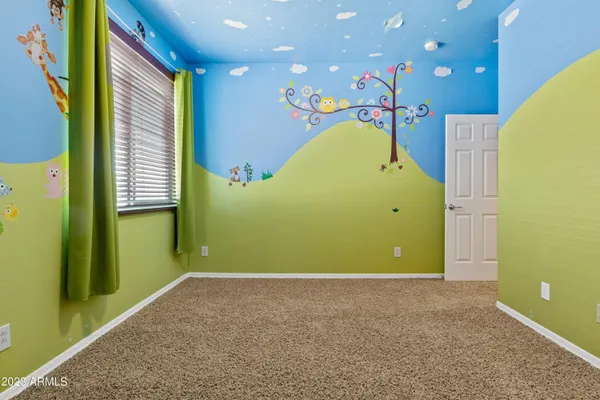 a room with furniture and window