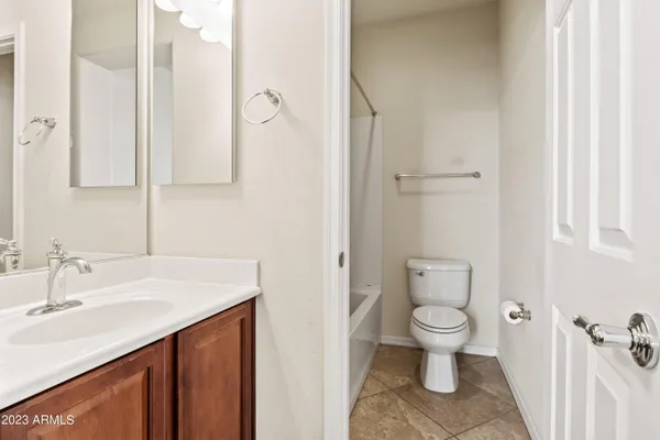 a view of balcony with furniture