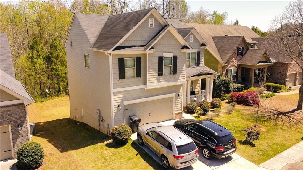 3402 Lynne Road Powder Springs, GA 30127 - Photo 1 of 1 a view of a house with a yard