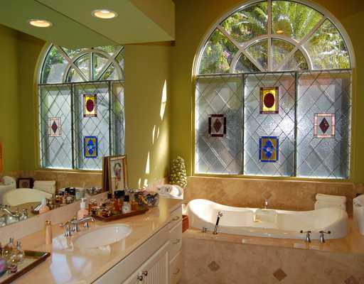 5876 Windsor Terrace Boca Raton, FL 33496 - Photo 7 of 16 a bathroom with a sink and a mirror