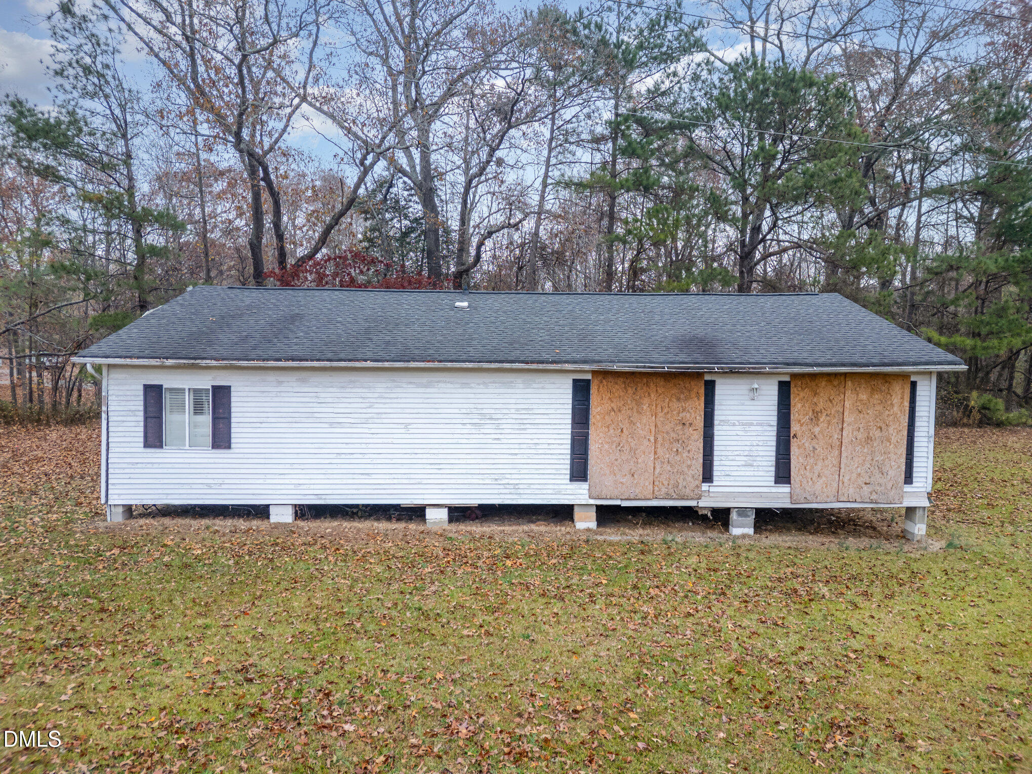 6801 Rock Service Station Road Raleigh, NC 27603 - Photo 28 of 35 a front view of house with yard