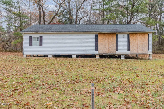front view of house with a yard