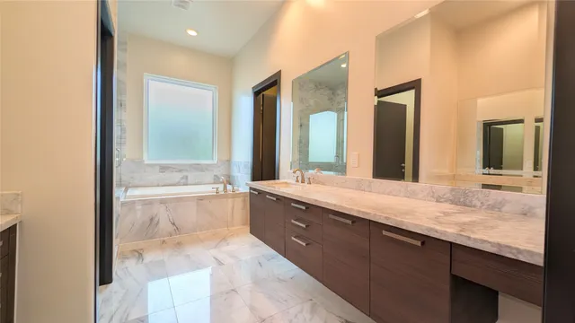 a bathroom with a sink and a shower