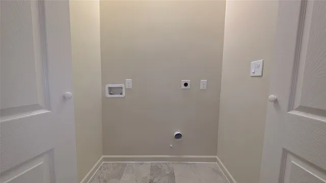 a view of empty room with a ceiling fan