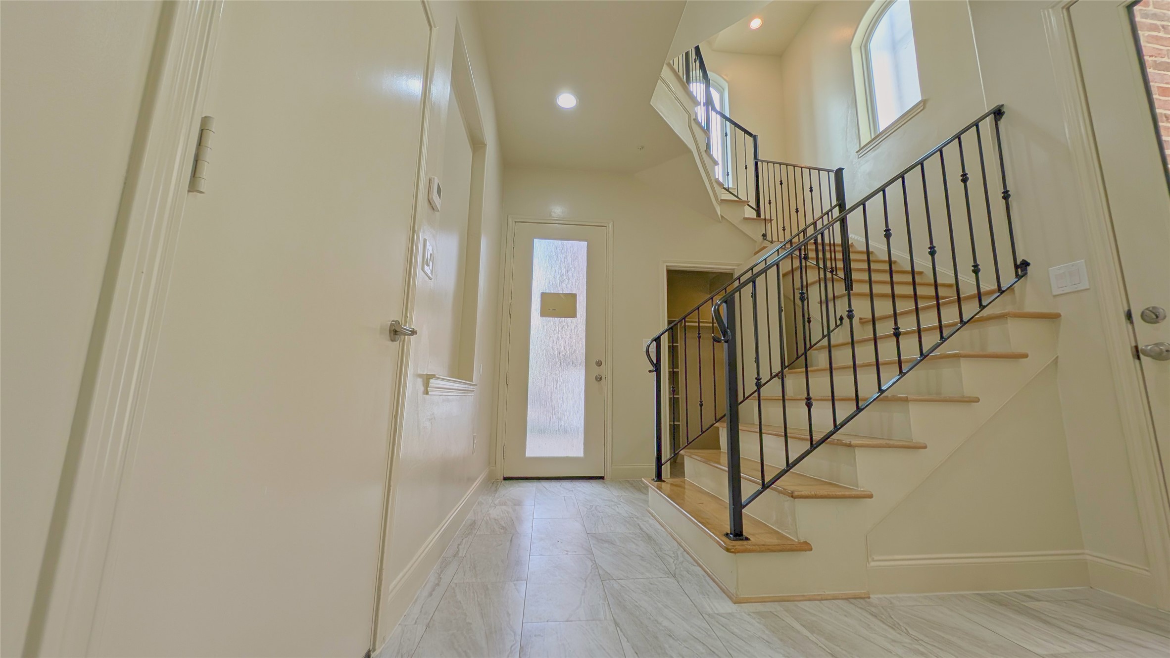 1844 Colquitt Street Houston, TX 77098 - Photo 5 of 40 a view of entryway and hall with wooden floor
