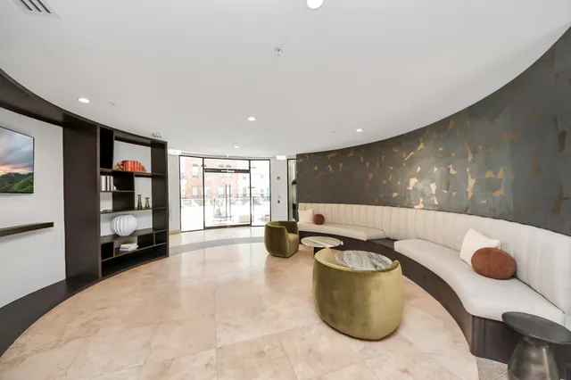 a living room with furniture window and flat screen tv