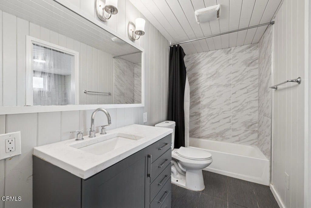 1841 South F Street Oxnard, CA 93033 - Photo 12 of 27 a bathroom with a sink toilet and shower