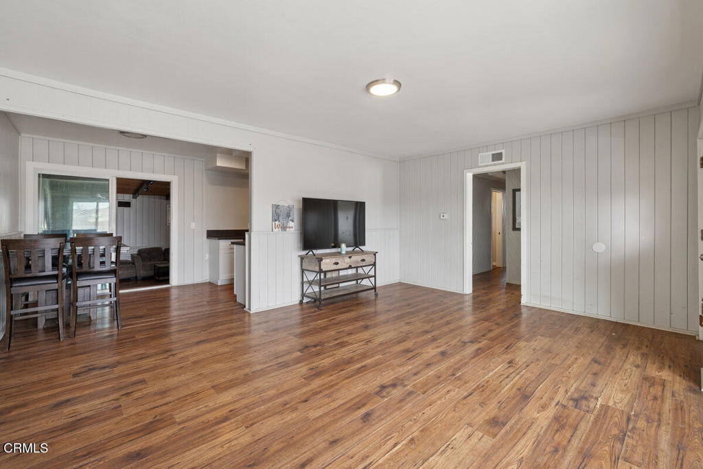 1841 South F Street Oxnard, CA 93033 - Photo 2 of 27 a view of a livingroom with furniture and wooden floor