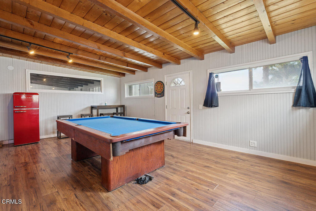 1841 South F Street Oxnard, CA 93033 - Photo 22 of 27 a room with table tennis and wooden floor
