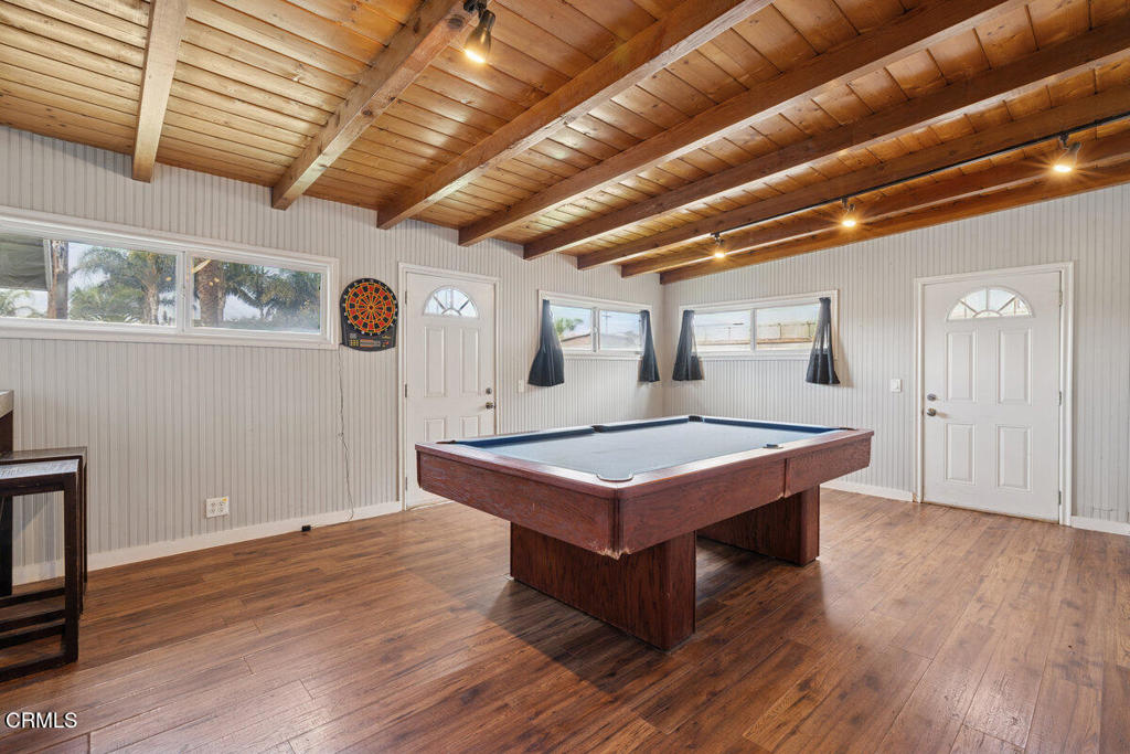 1841 South F Street Oxnard, CA 93033 - Photo 23 of 27 a room with pool table and wooden floor