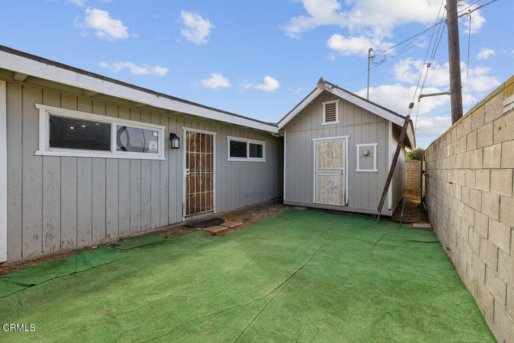 1841 South F Street Oxnard, CA 93033 - Photo 24 of 27 a view of a house with backyard and garden