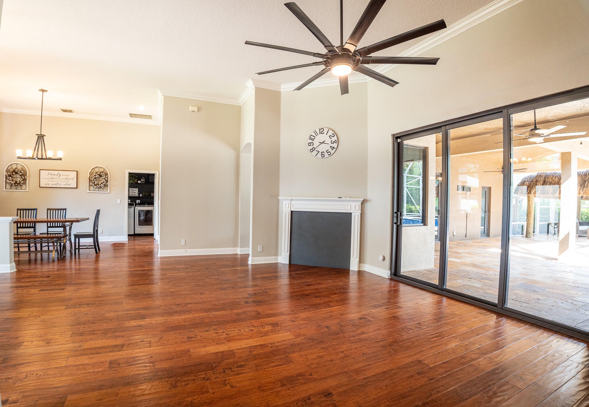 3516 185th Trail Loxahatchee, FL 33470 - Photo 12 of 56 a view of an empty room with window and wooden floor