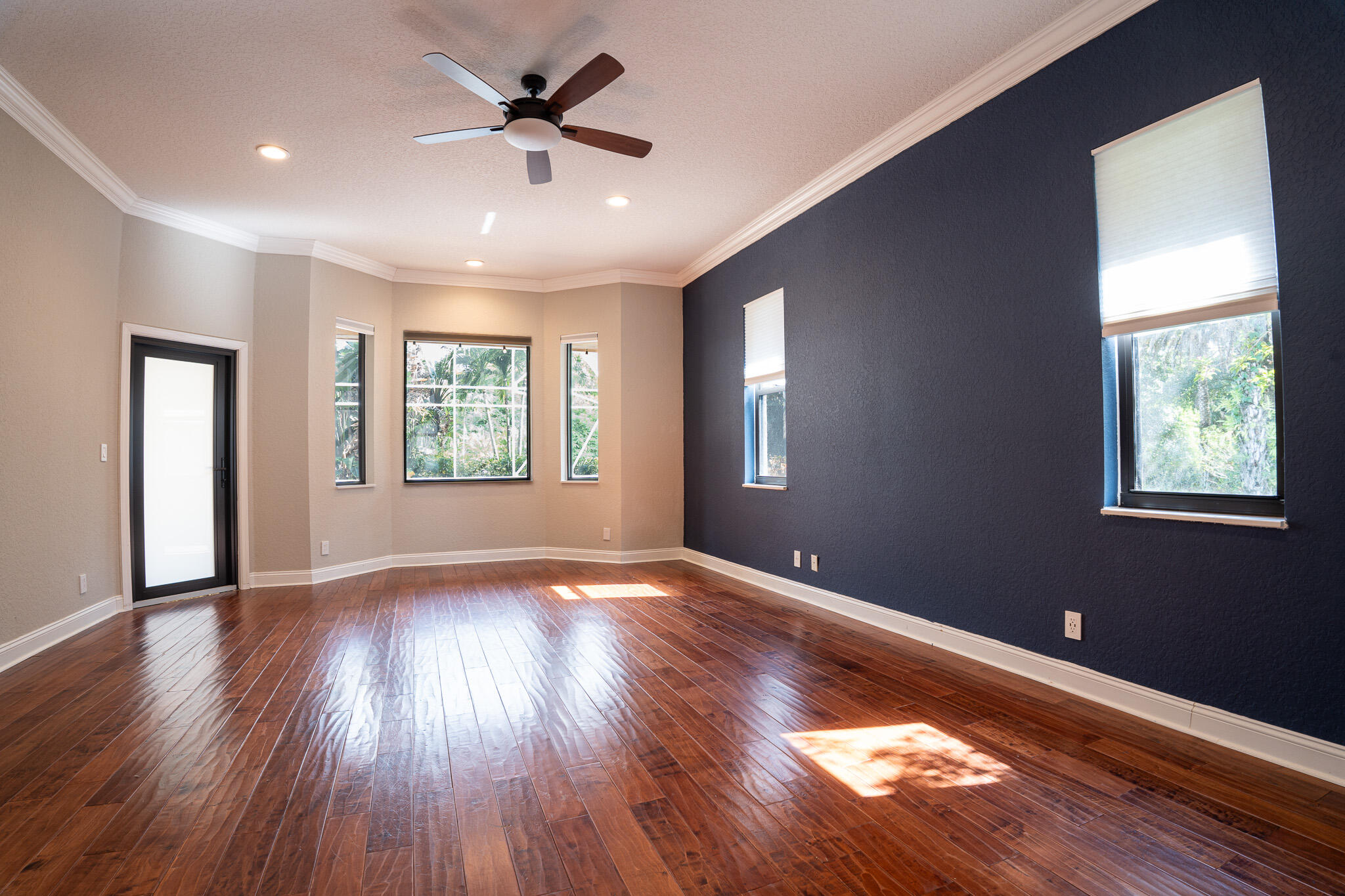 3516 185th Trail Loxahatchee, FL 33470 - Photo 18 of 56 a view of an empty room with window and wooden floor