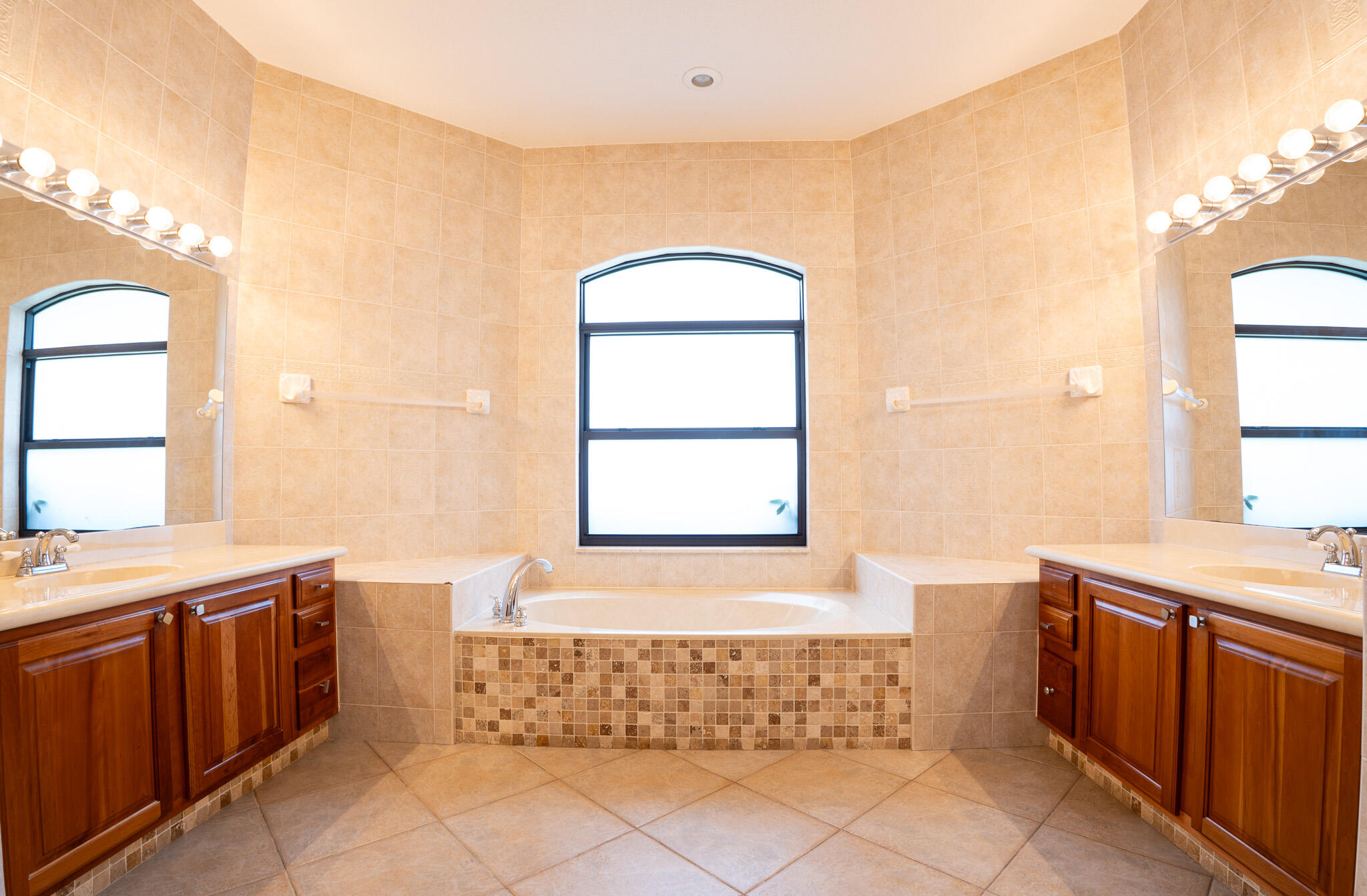 3516 185th Trail Loxahatchee, FL 33470 - Photo 20 of 56 a bathroom with a bathtub sink and mirror