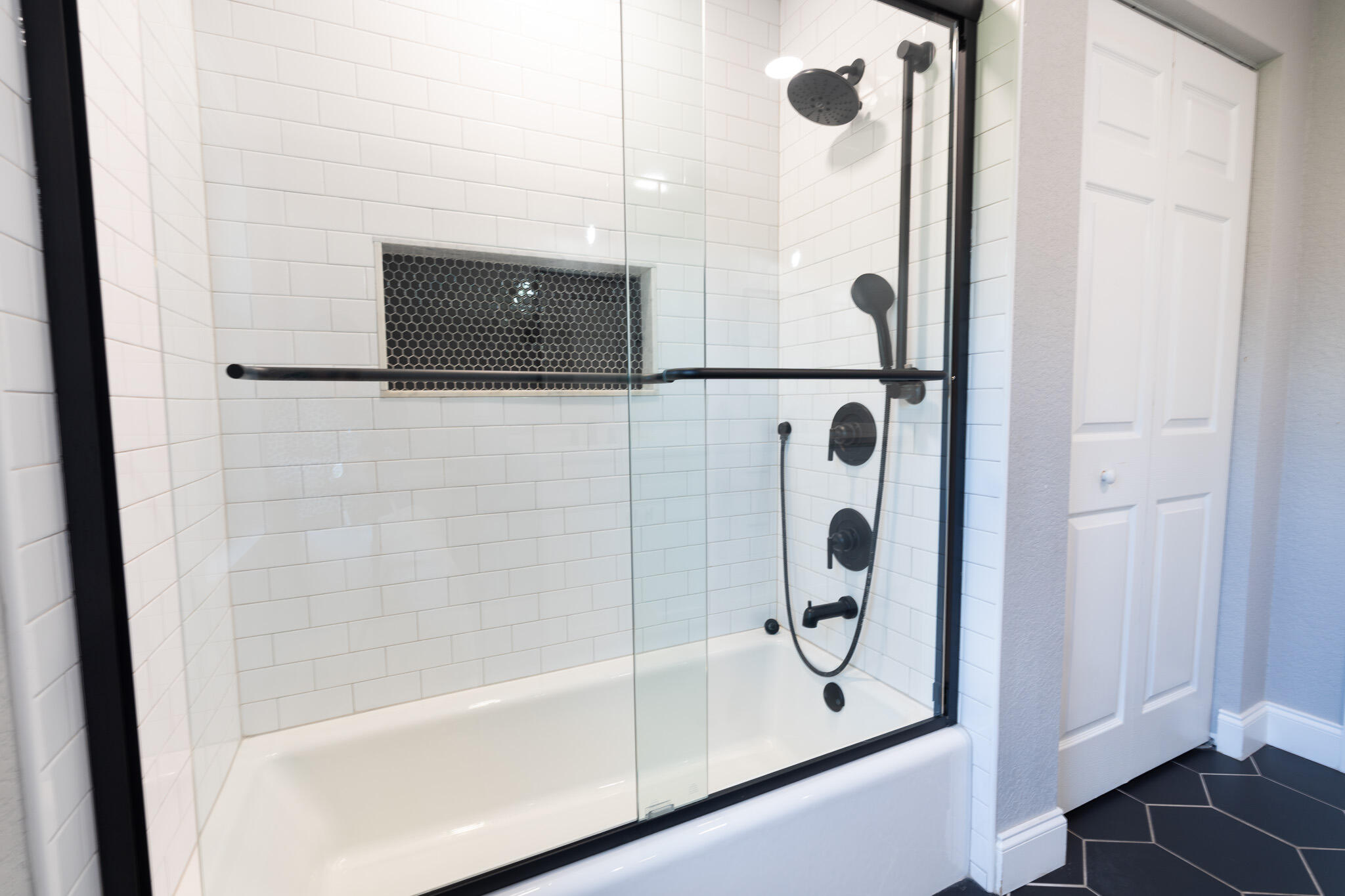 3516 185th Trail Loxahatchee, FL 33470 - Photo 28 of 56 a bathroom with a bathtub and a shower