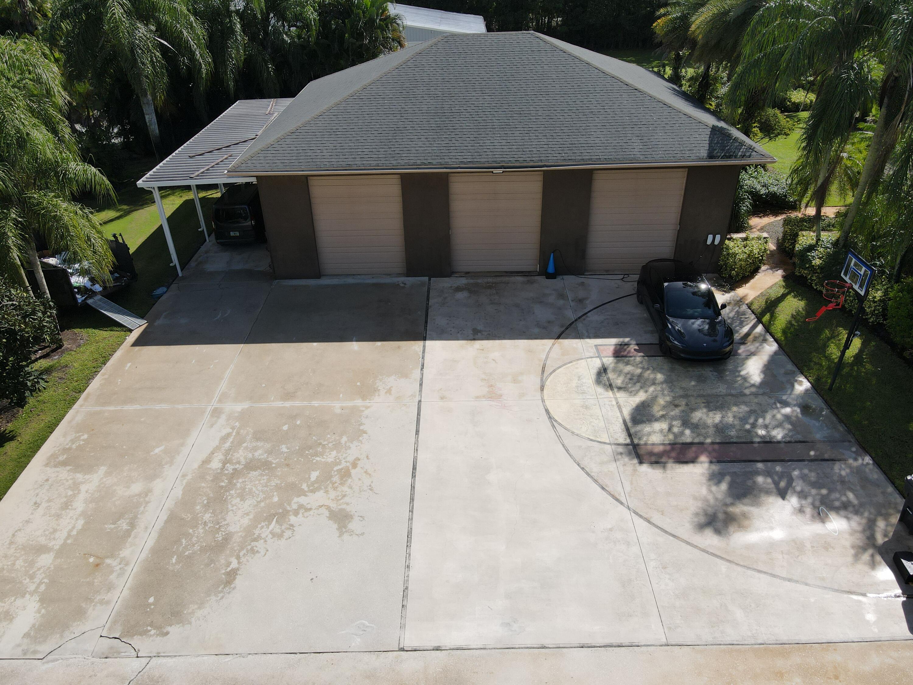 3516 185th Trail Loxahatchee, FL 33470 - Photo 5 of 56 a backyard of a house with seating space