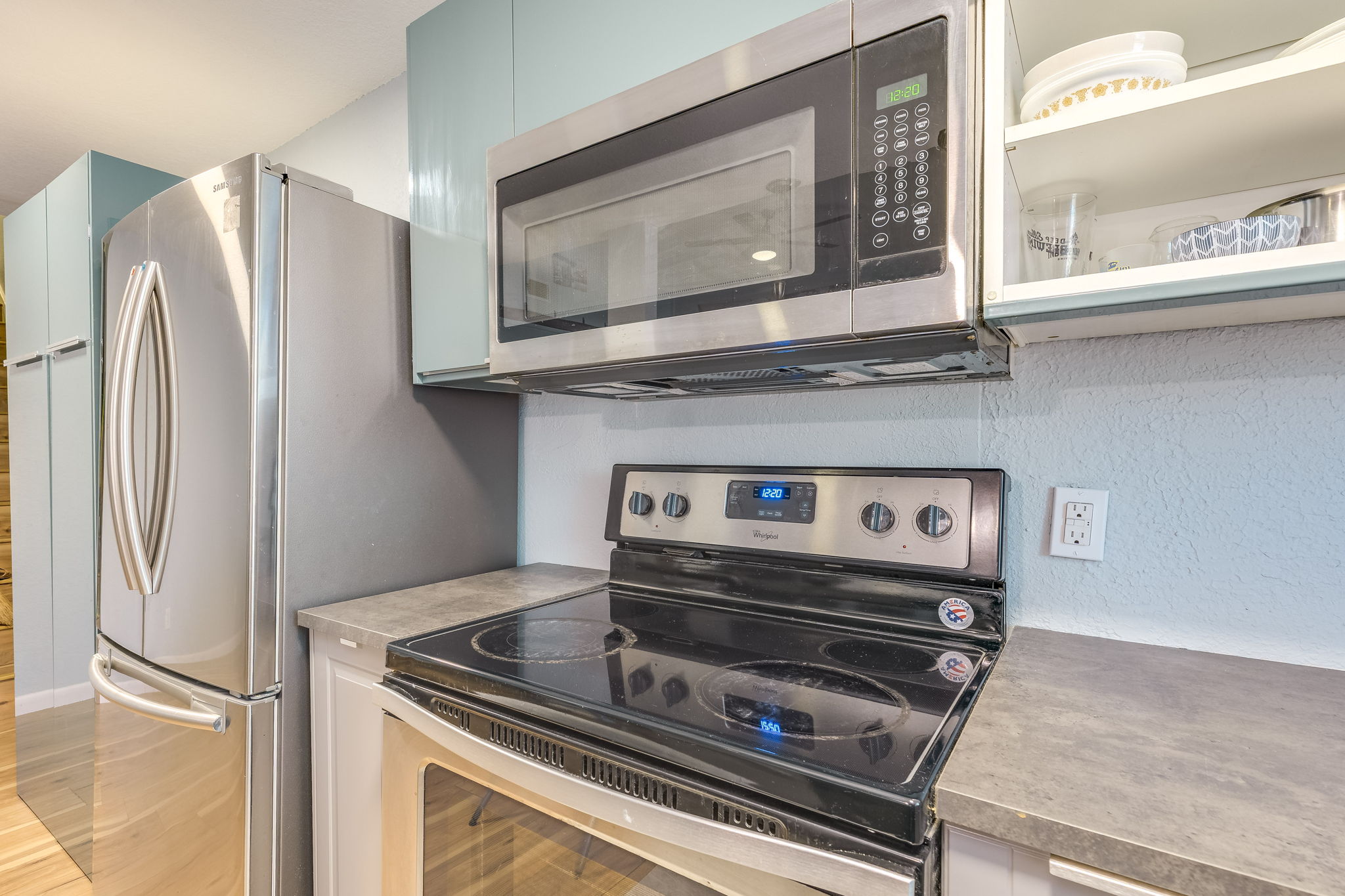 4307 South 1st Street, Unit 101 Austin, TX 78745 - Photo 15 of 33 a stove top oven sitting inside of a kitchen