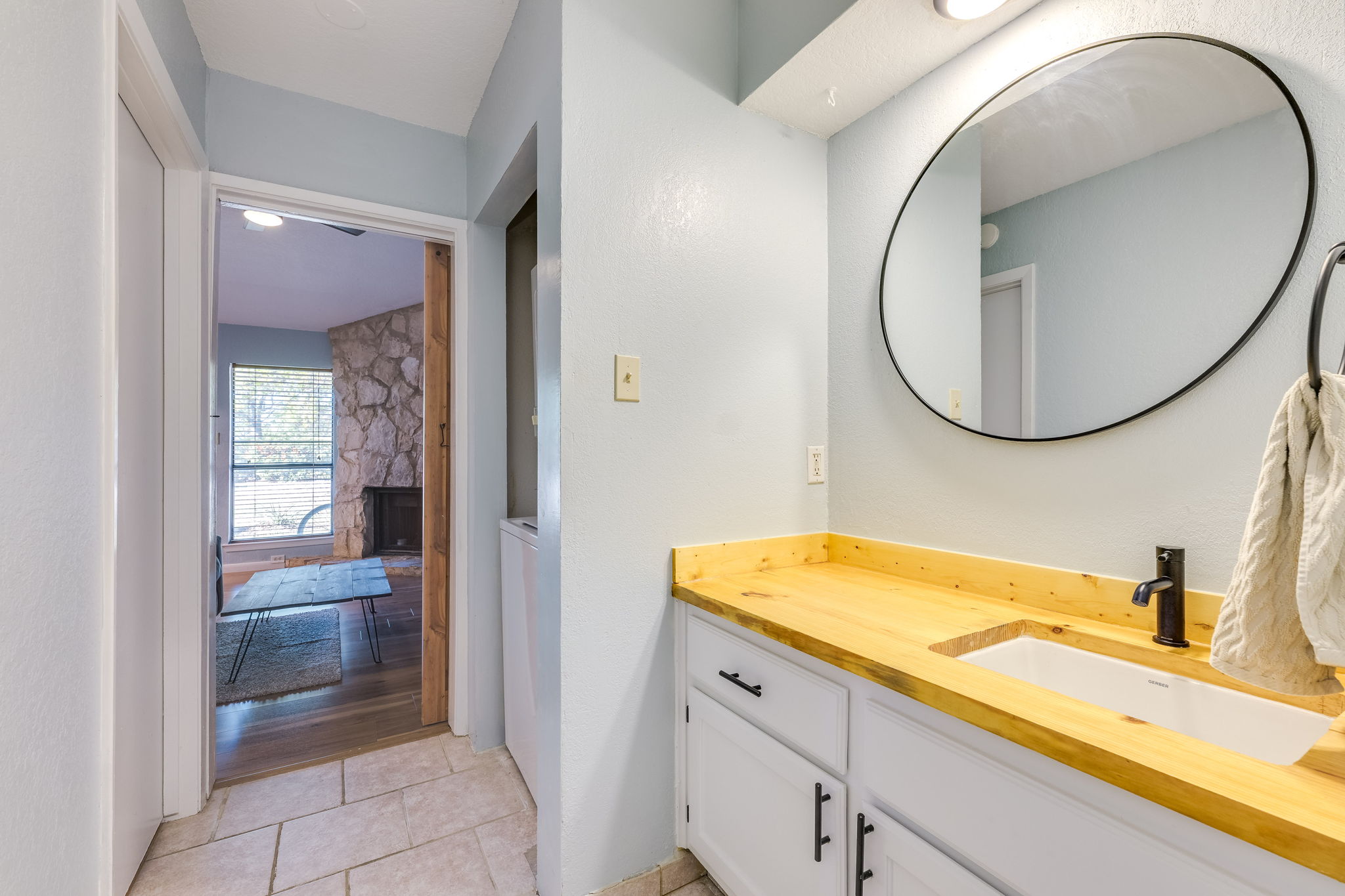 4307 South 1st Street, Unit 101 Austin, TX 78745 - Photo 17 of 33 a bathroom with a sink and a mirror