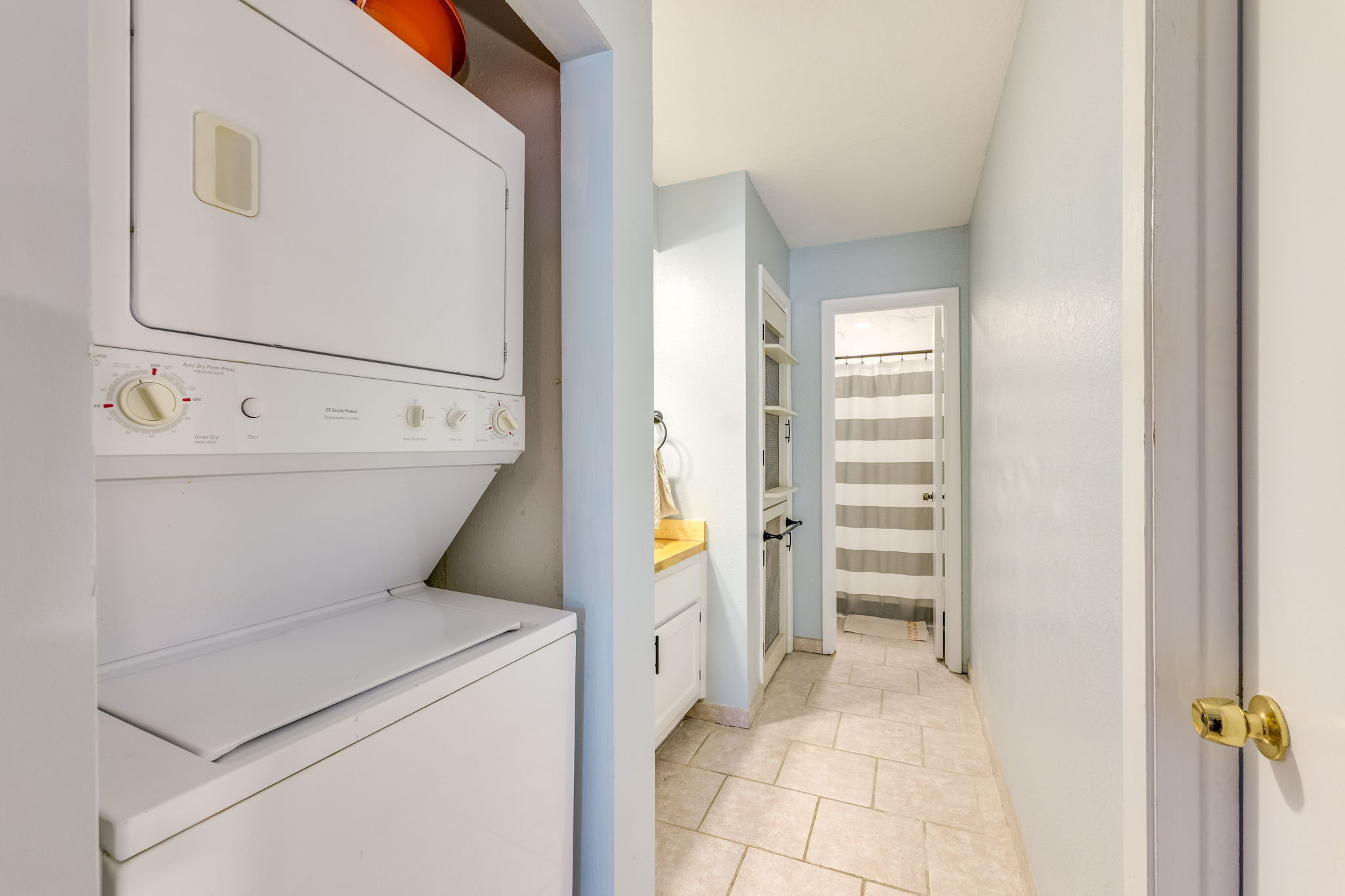 4307 South 1st Street, Unit 101 Austin, TX 78745 - Photo 18 of 33 a view of washer and dryer with bathroom in the background