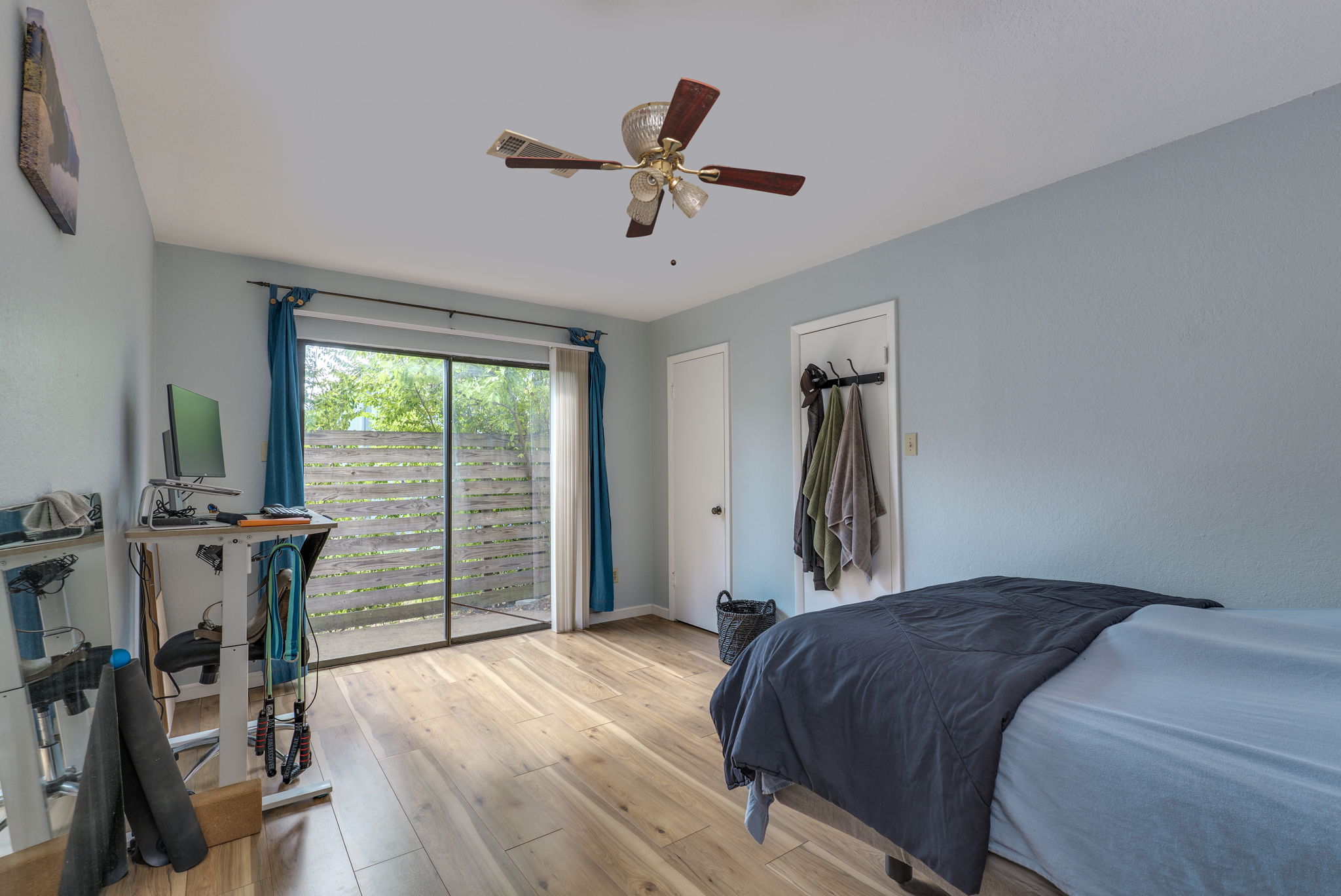 4307 South 1st Street, Unit 101 Austin, TX 78745 - Photo 21 of 33 a bedroom with a bed and a desk