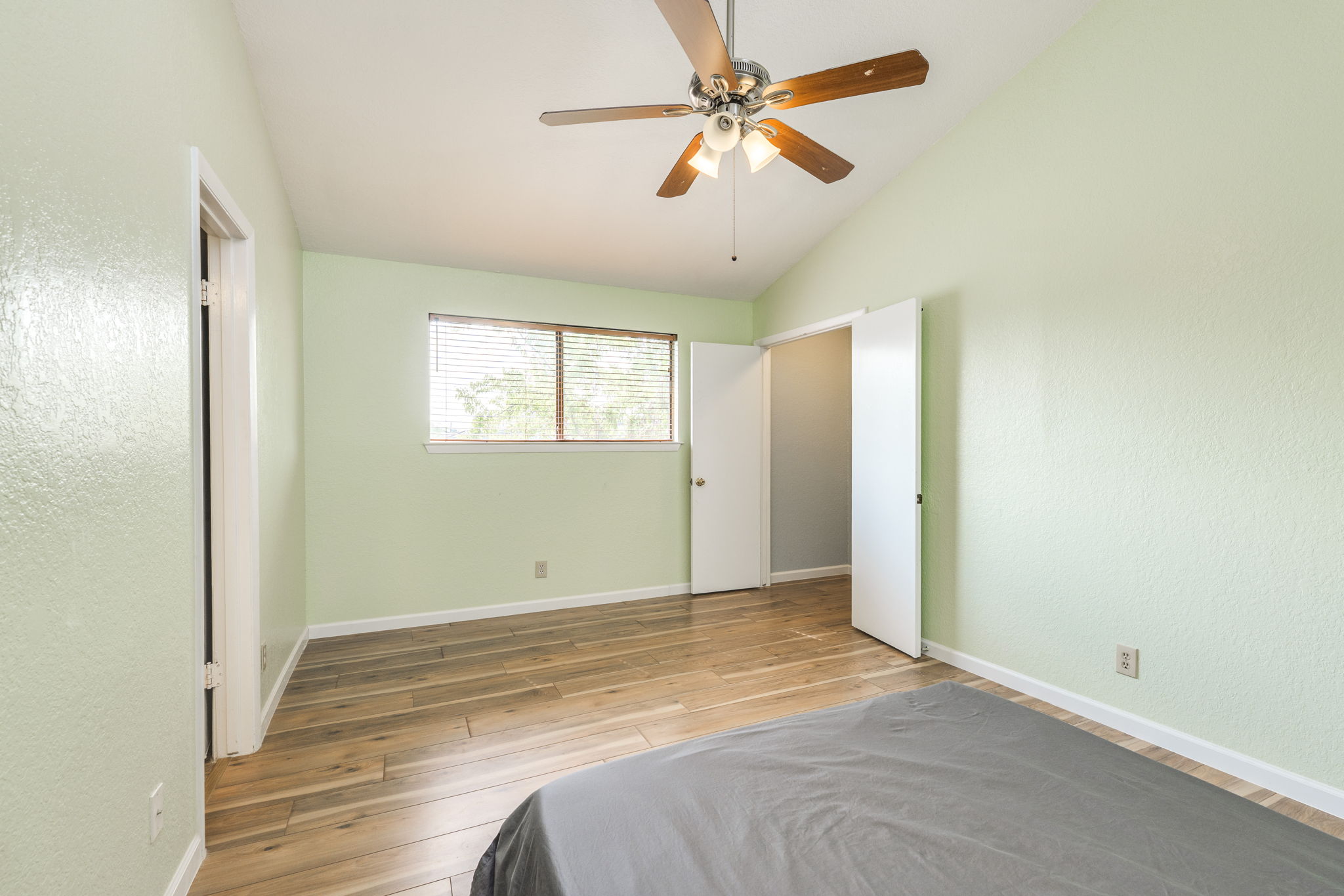 4307 South 1st Street, Unit 101 Austin, TX 78745 - Photo 26 of 33 a view of a livingroom with a window and a ceiling fan
