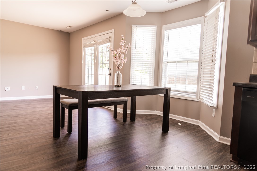 125 Cape Fear Road Raeford, NC 28376 - Photo 12 of 46 a view of a room with wooden floor and a window