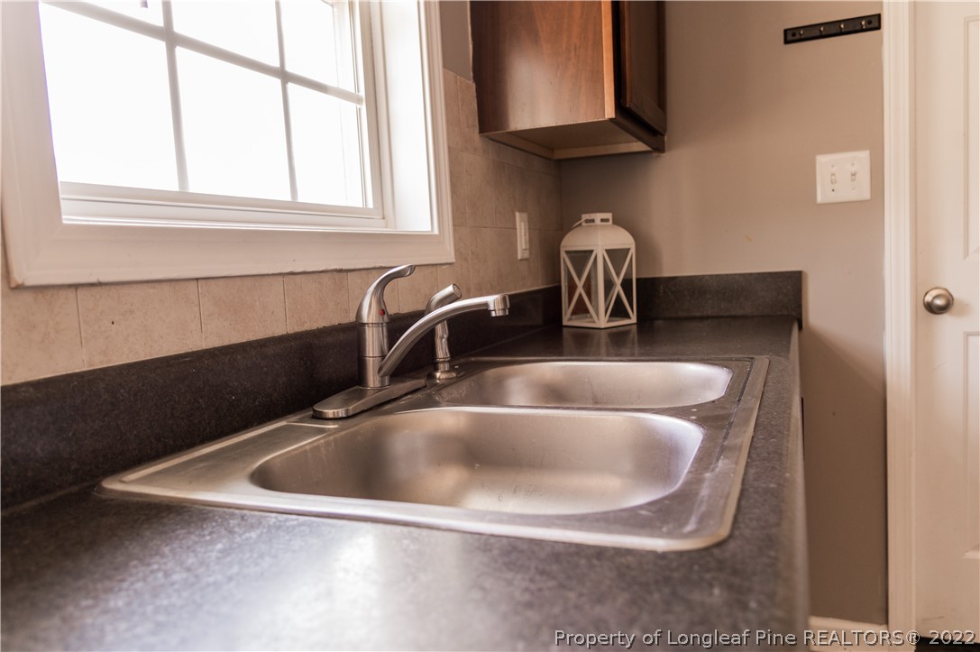 125 Cape Fear Road Raeford, NC 28376 - Photo 14 of 46 a close view of sink and tap