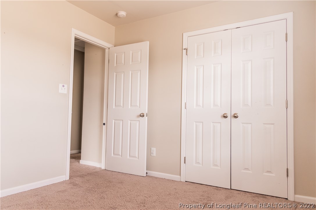 125 Cape Fear Road Raeford, NC 28376 - Photo 27 of 46 a view of a room with a wooden door