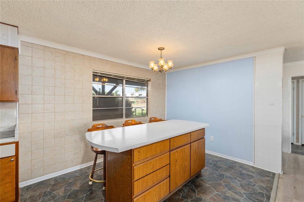 100 County Road 319 Early, TX 76802 - Photo 13 of 39 a room with table and window