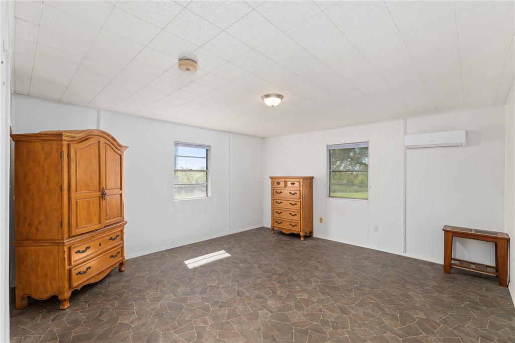 100 County Road 319 Early, TX 76802 - Photo 14 of 39 a view of an empty room with a window